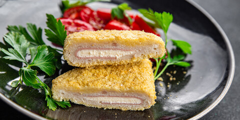 cutlet cordon bleu fresh chicken meat, cheese, bacon meal food snack on the table copy space food background rustic top view