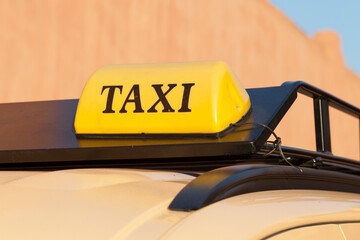 Moroccan yellow taxi sign