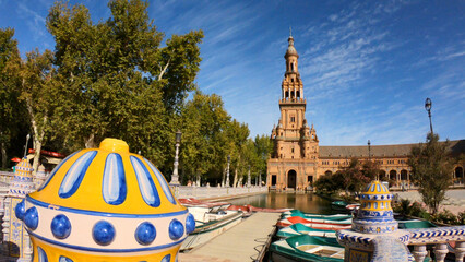 Seville, Spain, September 11, 2021: Colorful boats in the canals of the Plaza Espana. The Spanish...