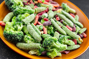 vegetable frozen mix broccoli, corn, carrot, green pea, green bean, bell pepper, bean fresh healthy eating cooking appetizer meal food snack on the table copy space food background top