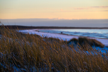 Baltic sea coast in winter evening, Liepaja, Latvia.