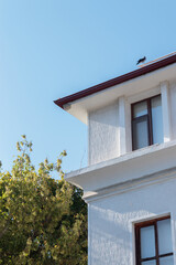 A modern minimalist house with a 90s theme