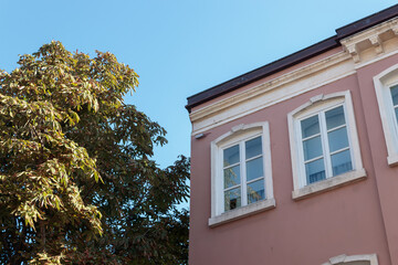 minimalist classical architecture with wooden windows