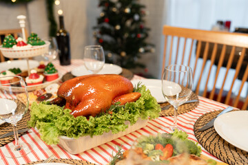 Christmas and roast food on dining table