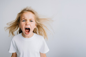 Portrait of a cute kid, girl, screaming, white and neutral teeshirt and background, fear, anger - obrazy, fototapety, plakaty