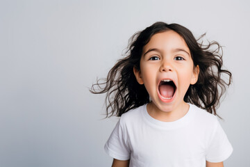 Portrait of a cute kid, girl, screaming, white and neutral teeshirt and background, fear, excitment