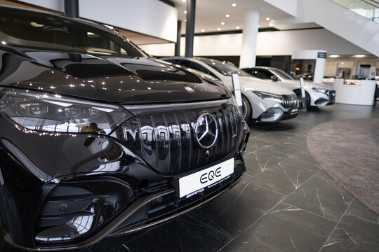 new black electric Mercedes-AMG EQS 53 4MATIC car in showroom, EV contemporary, technological advancements in automotive industry, environmental cleanliness vehicle, Frankfurt - November 9, 2023