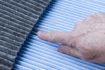 Close up, clean and dirty cabin air filter for home air purification, replaced a new filter into...