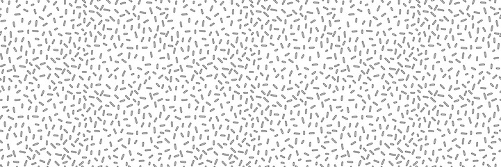 Fototapeta na wymiar Small dash monochrome seamless pattern. Scattered organic line element on white background. Vector illustration for textile, wallpaper, decor. 