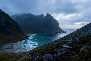 Kvalvika Beach at sunset in Lofoten, Norway in the Arctic Circle.  One of Norway's most beautiful...