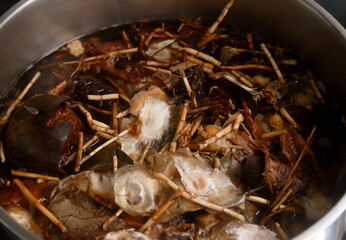 Nearly finished boiling the Chinese herbal juice for internal body heat or internal hot relief. refresh herbal juice. Jab-Liang. At least 10 Chinese herbal are ingredients of Jab-Liang juice. Nearly f