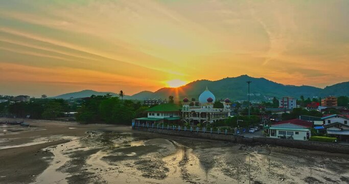 .aerial view scenery stuning sky in sunset above the the mosque..Scene of Colorful romantic sky sunset with Changing the color of the sky background. .beautiful sky at sunset above the mosque