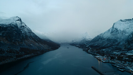 Aerial Drone of Gryllefjord in Lofoten, Norway.  A small fishing village in the Arctic Circle of...