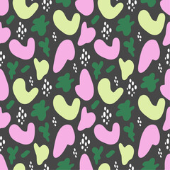Abstract pattern design with green and pink shapes on dark background