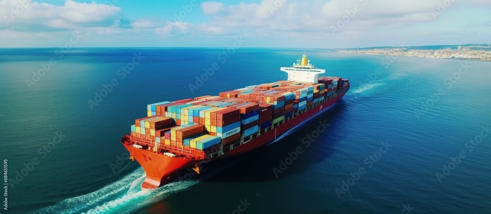 Poster bird s eye view of numerous containers aboard a ship transporting cargo globally copy space image