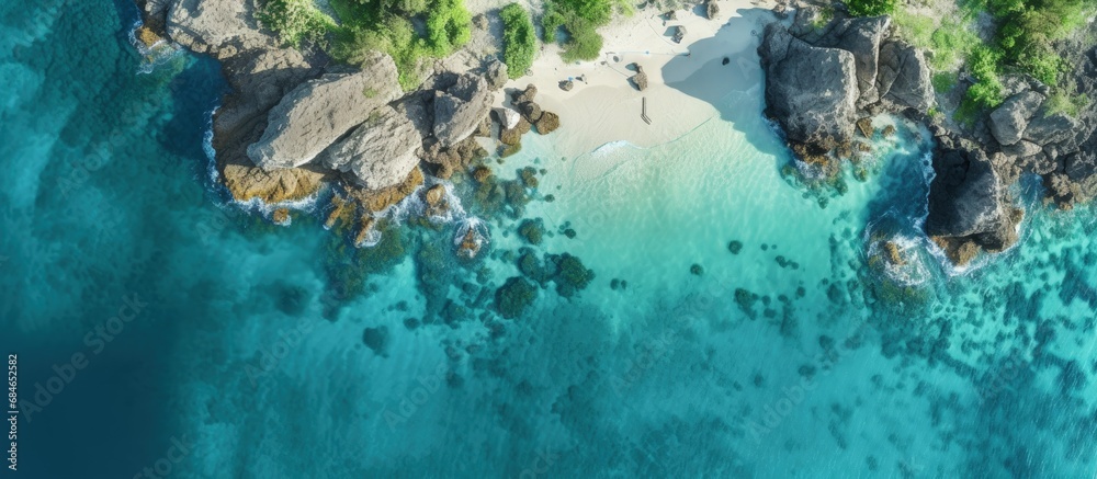 Poster aerial drone photo of small island with limestone and emerald sea copy space image