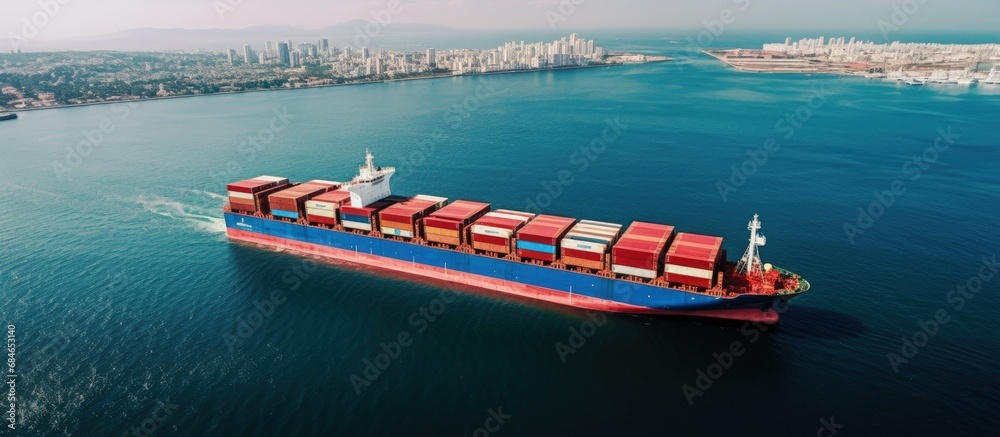 Poster bird s eye view of numerous containers aboard a ship transporting cargo globally copy space image