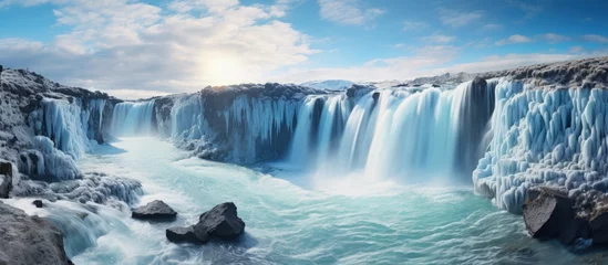 Keuken spatwand met foto Breathtaking waterfalls created by Iceland s melting glaciers copy space image © vxnaghiyev