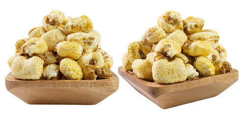 Puffed corns in wooden bowls isolated on white background