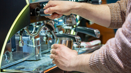 Barista coffee service concept.Barista women using coffee machine to make coffee in cafe