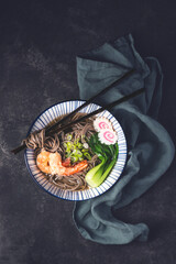 Kombu algae, seaweed salad in a ceramic hand bowl. Traditions of Japan and the Far East. Seaweed is...