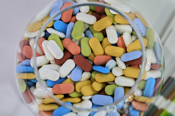 pills in a glass