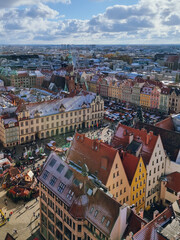 Fototapeta na wymiar Panoramic view to Wroclaw from St Elizabeth church tower in Wroclaw, Poland. Best viewpoint in Wroclaw. Wroclaw roofs from above