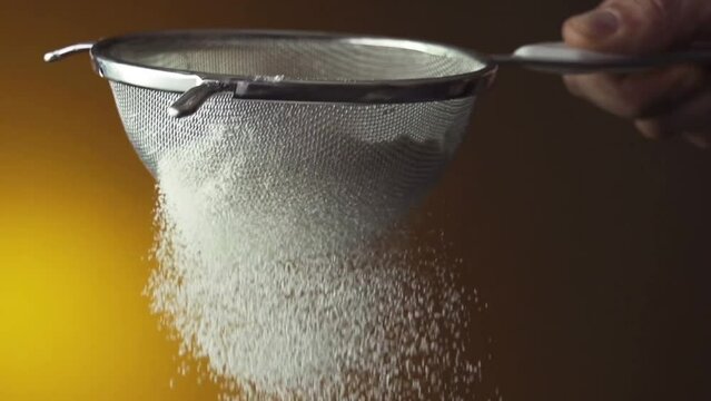 Flour being sieved