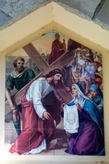 Fotobehang Stations of the Cross in Medjugorge sanctuary, Bosnia & Herzegovina. Station 6, Veronica wipes the face of Jesus. © Julian