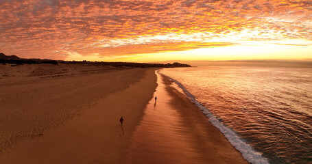 Two People Footprints in Sand Cabo Beach Bliss at Sunset Waves Meeting BCS MexicoShores