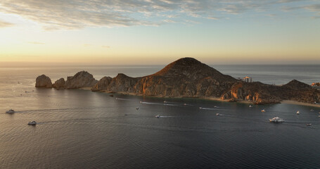 Los Arcos Rocky Seaside Cliffs Sunrise Morning Fishing Boats Head Out to Sea Cabo San Lucas Mexico BCS