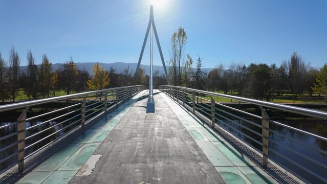 Hiker's point of view along the Tamega river city park in Chaves, Portugal.