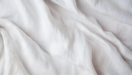 Background of fabric made from natural linen and cotton. Abstract white crumpled linen