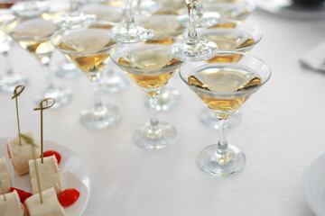 stylish glass glasses with champagne for a celebration