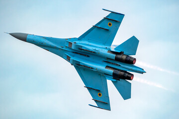 Ukrainian fighter jet plane afterburner take off - obrazy, fototapety, plakaty