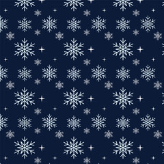 Fototapeta na wymiar Seamless pattern with snowflakes on blue background.