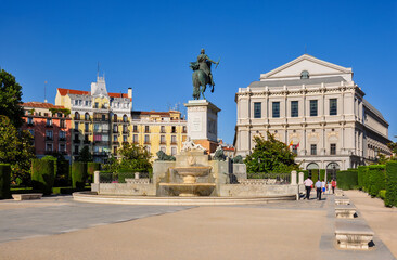 Fototapeta premium Monument to Felipe IV on Eastern square (Plaza de Oriente) and Royal theatre (Teatro Real), Madrid, Spain
