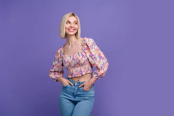  Photo of excited dreamy woman dressed flower print blouse looking empty space isolated purple color background © deagreez