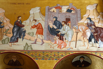 Resurrection orthodox cathedral, Podgorica, Montenegro. Fresco detail. Jesus healing the sick and...