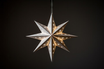 A white and gold star hanging from a string created with generative AI technology