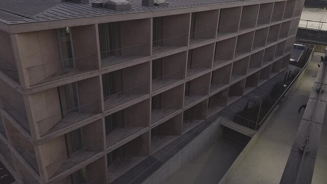 Modern building at the end of the day overlooking the Mondego River.