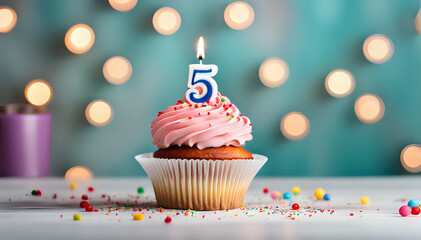 Birthday cupcake with lit birthday candle Number five for five years or fifth anniversary - obrazy, fototapety, plakaty