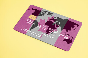 Bank Credit Card with world map and Canadian flag