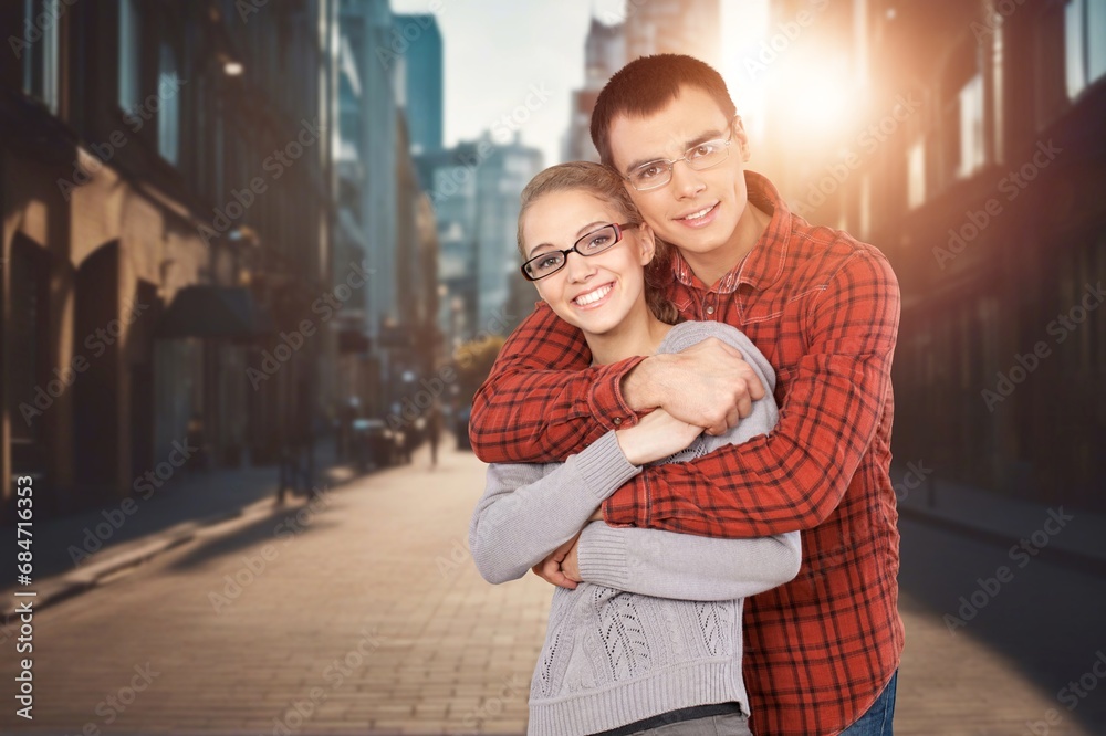 Wall mural loving young happy couple hugging