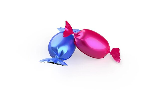 Blue and pink wrapped hard candies on white background