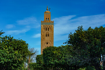 Fototapeta na wymiar Morocco. Marrakesh. The minaret of the Koutoubia mosque with gardens