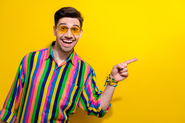 Photo of man ask you come to the party with free alcohol wearing vintage outfit point finger copyspace isolated on yellow color background