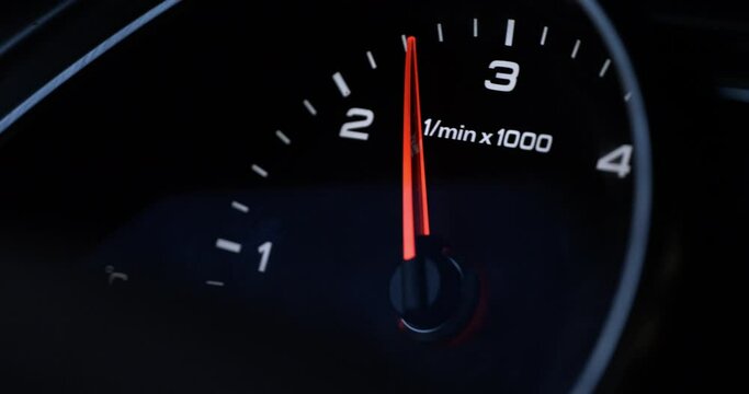 Super slow motion macro of speedometer scoring high speed of anonymous prestigious luxury modern car at 1000fps.
