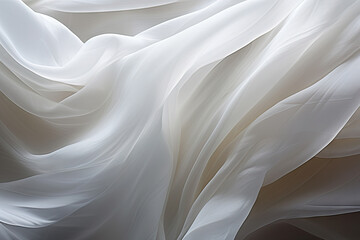A close up of a white fabric on a bed