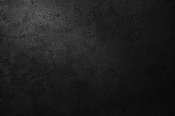 Old black concrete wall texture. Grunge background